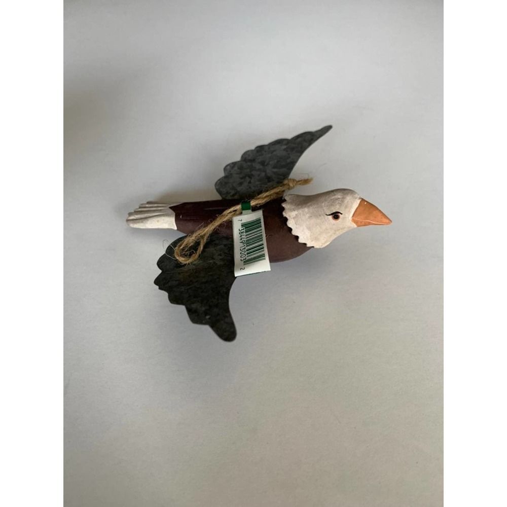 midwest of cannon falls ornament flying eagle spread metal wings.   Christmas de